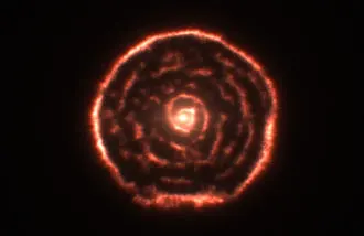 Una Nebulosa Espiral alrededor de la Estrella R Sculptoris